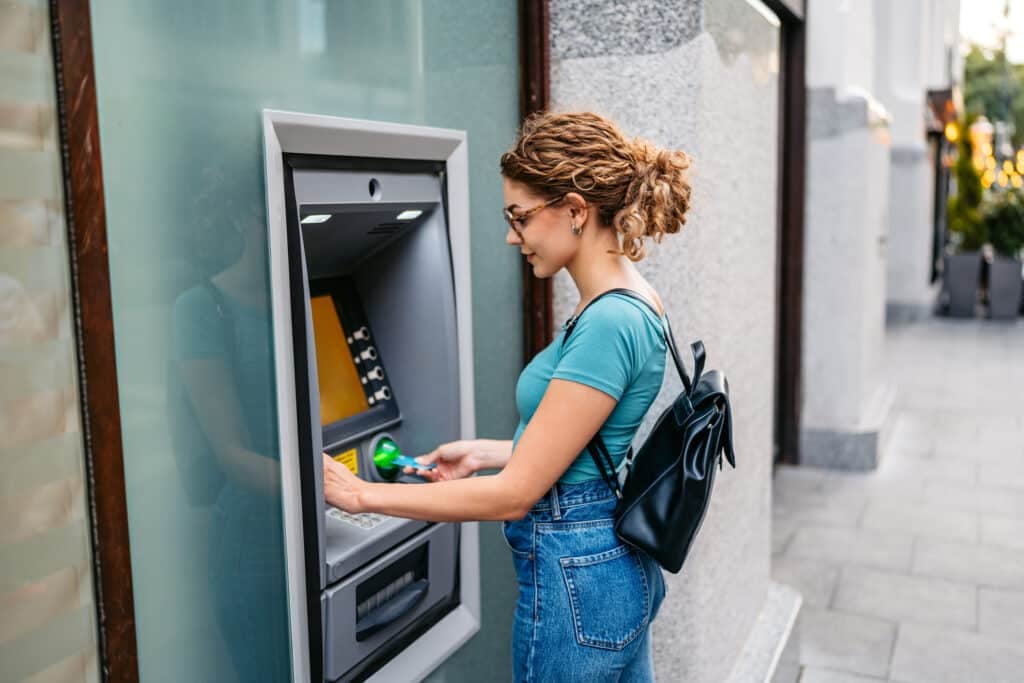 Withdrawing money from an ATM is an example of MFA that helps prevent fraud.
